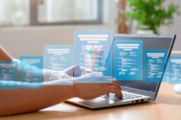 Man completing a checklist of online digital forms for assessing business performance.