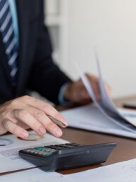 Accountant Conducting Financial Calculations for Data Accuracy