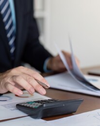 Accountant Conducting Financial Calculations for Data Accuracy